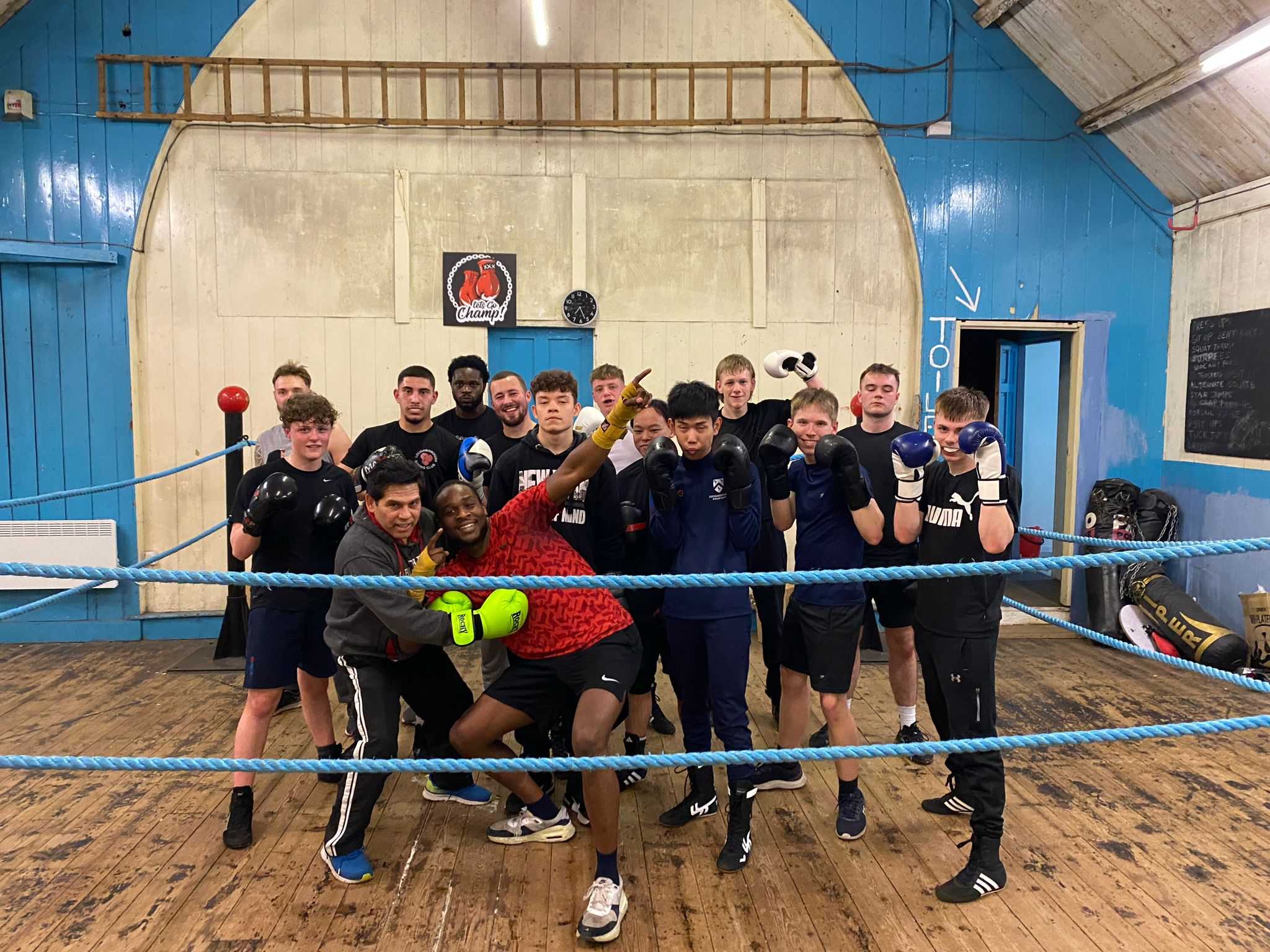 Coach Amo demonstrating pad work at Loughborough Boxing Club